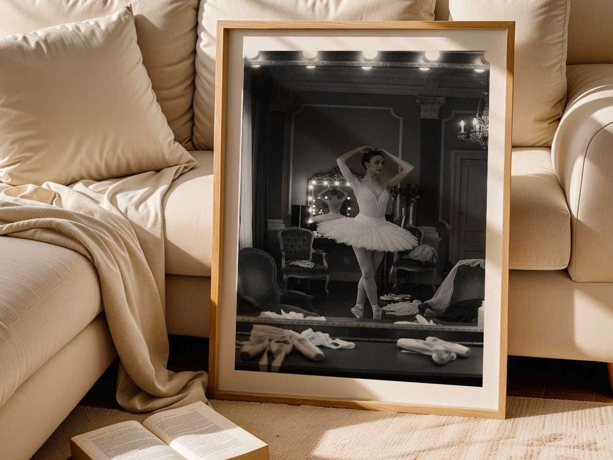 Backlit silhouette of a dancer and her mirrored profile, light revealing contours and quiet intensity