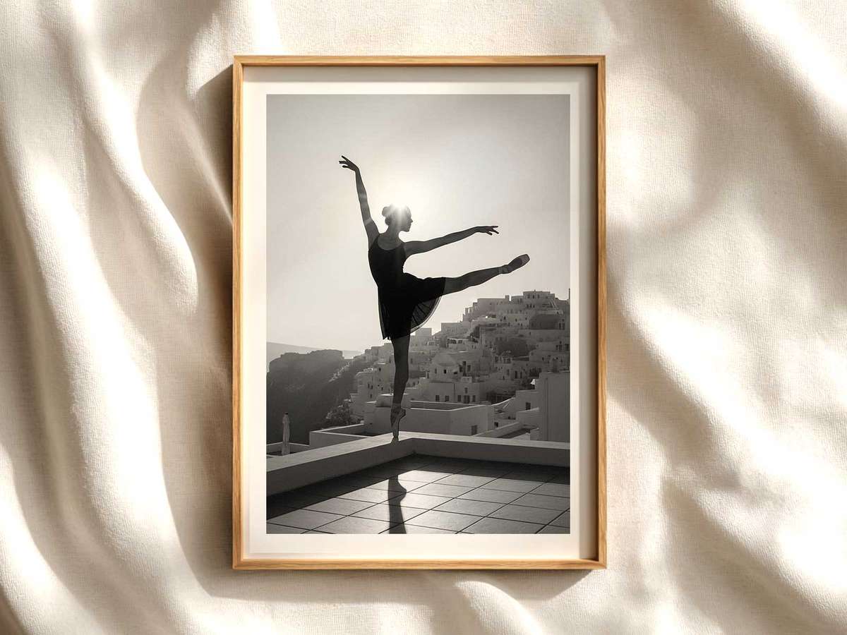 Ballet dancer in soft arabesque posed beside an ancient Greek column with warm Mediterranean light