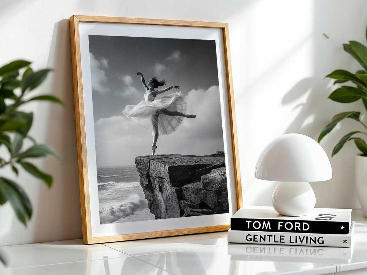 Two dancers performing a delicate duet on a clifftop, one supporting the other above the void with focused stillness