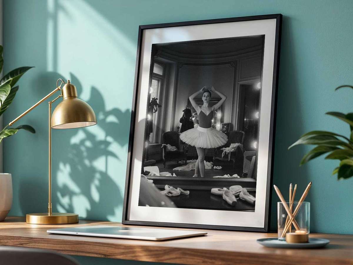 Dancer finishing a turn with mirror reflection matching her final line in perfect unison