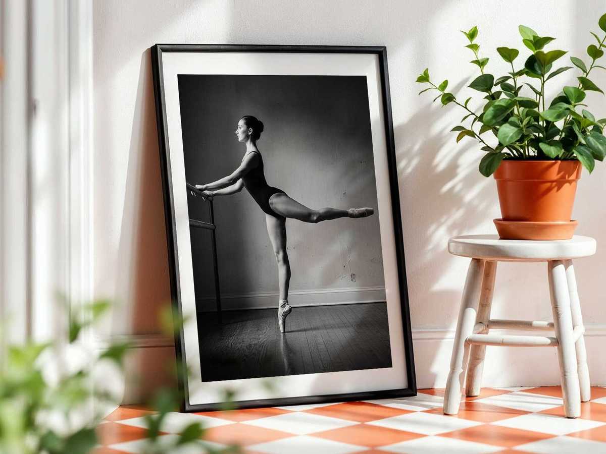 Close-up of a dancer’s hands lightly gripping the barre, suggesting concentration, support and subtle gesture