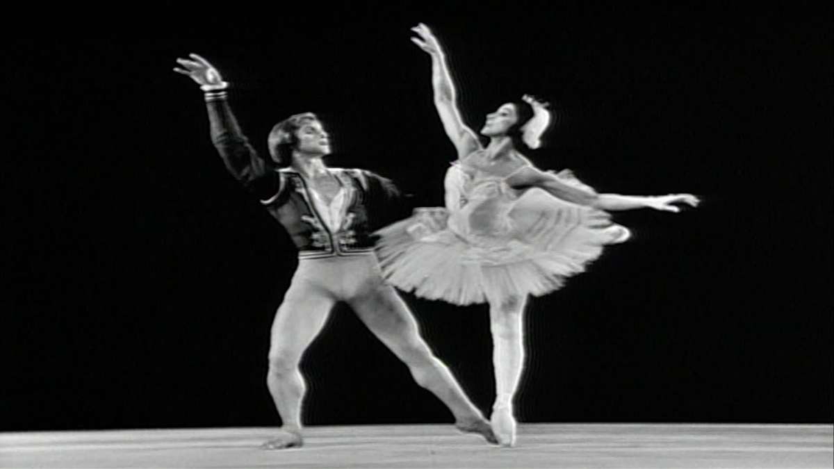 Young Margot Fonteyn in her early Royal Ballet costume during a stage debut, poised on pointe with a focused expression