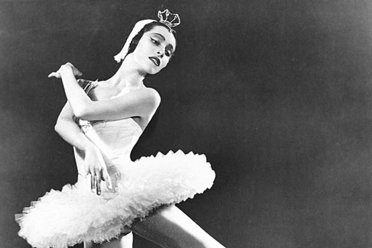 Maria Tallchief performing as the Firebird in full costume and dramatic stage lighting