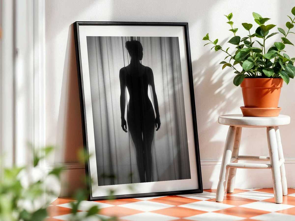 Ballerina against a minimalist background so the elongated line and silhouette stand out