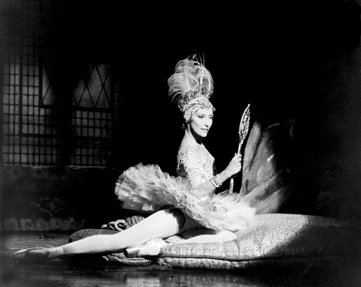 Natalia Makarova in a class demonstrating Vaganova technique at the barre, focused posture and clean port de bras