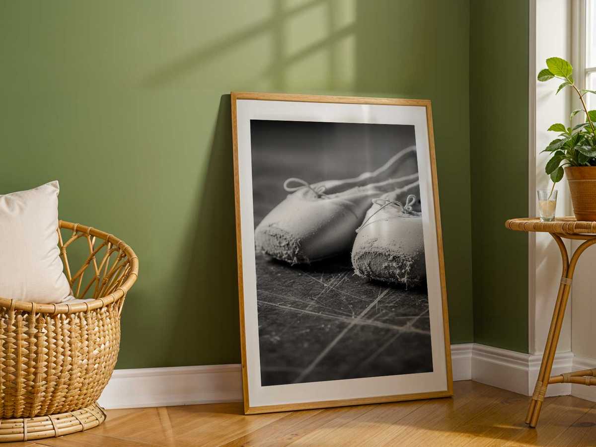 Ballerina depicted with ample negative space to accentuate the purity of the line