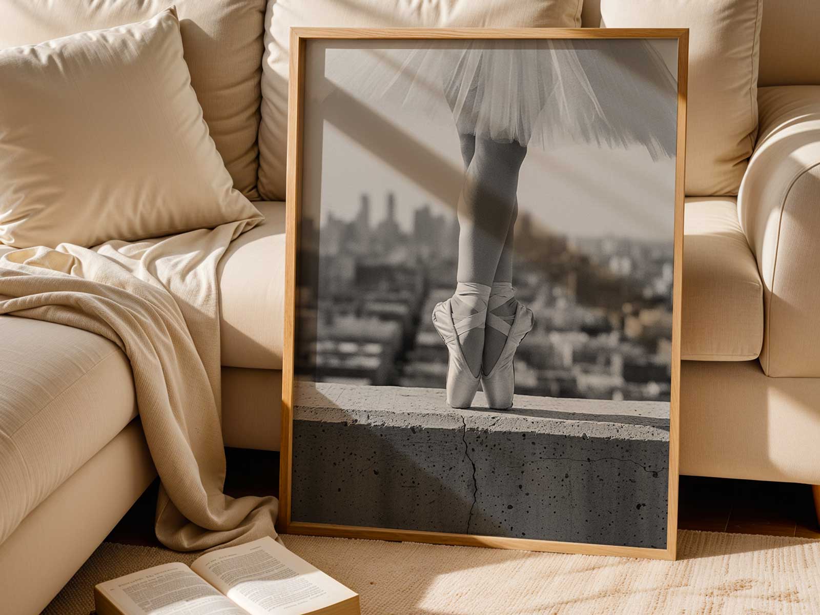 Close-up black-and-white shot of pointe shoes and the dancer's shadow, highlighting texture and high-contrast lines