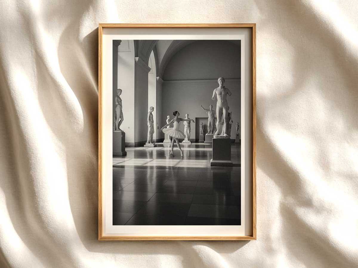 Close-up portrait of a ballerina posed like a classical sculpture, soft warm tones and textured paper effect