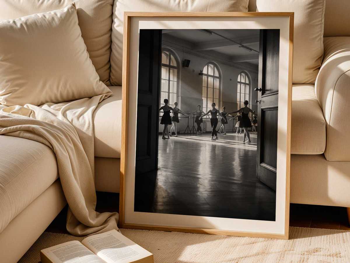 Ballet dancer at the barre reflected in the mirror, a suspended moment of focus and sculpted line