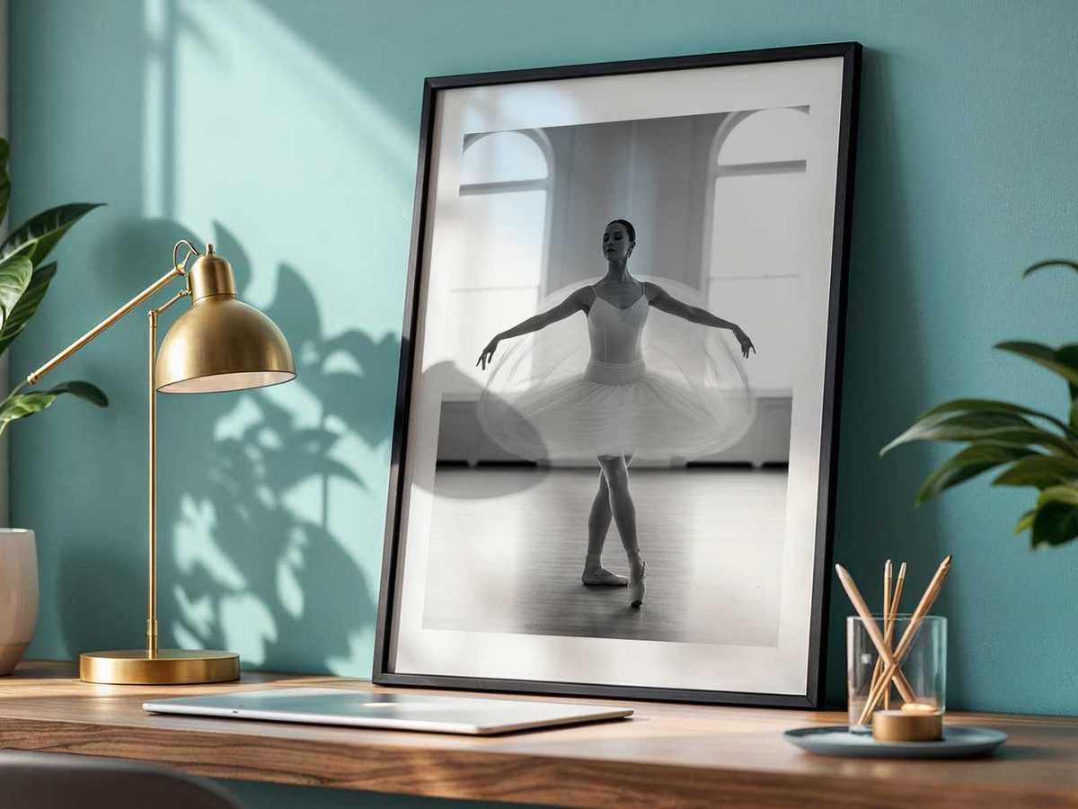 Silhouette of a dancer framed by a large studio window, the light defining the emerging contours of a gesture in progress
