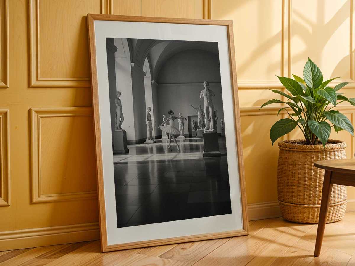 Full-length ballerina in classical pose against a muted backdrop, grainy texture and restrained color palette