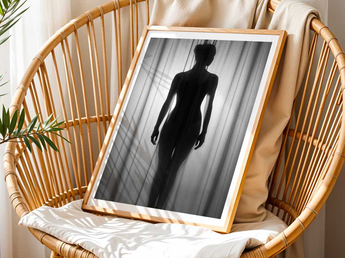 Diaphanous veil flowing through the space between the ballerina’s extended arms